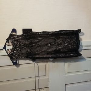 Black and light pink, mid back zip, no sleeves, around the neck, forever 21, L